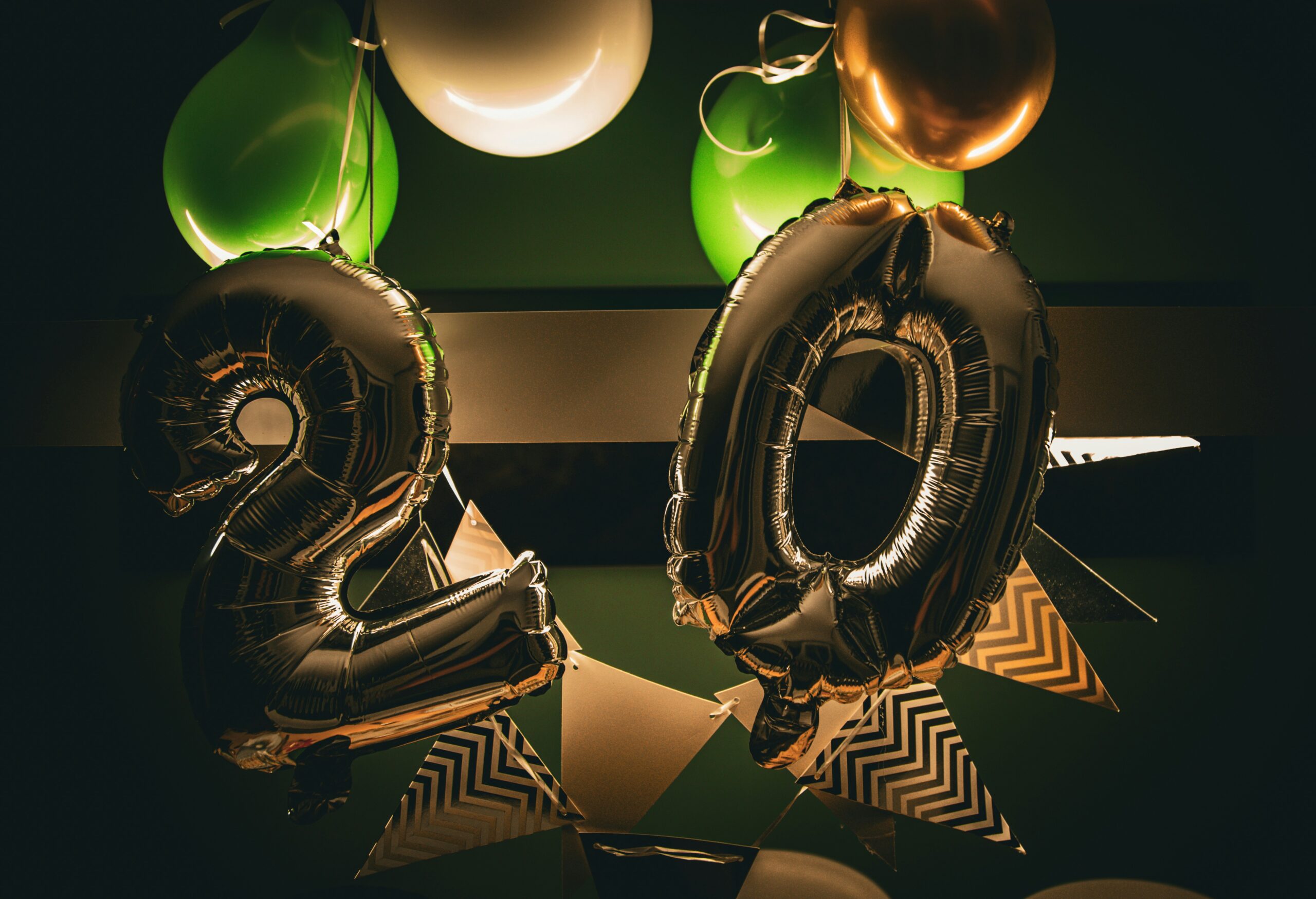 A couple of balloons sitting on top of a table